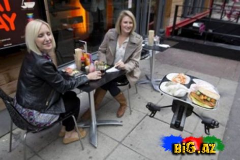 Dünyanın ilk sehrli restoranı: podnoslar göydə uçur (Foto, Video)