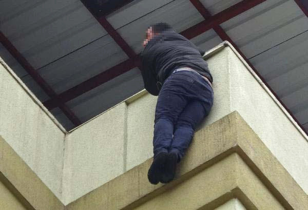 Simit satan kişi binaya çıxıb özünü atmaq istədi: 