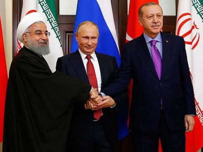 Putinin Ərdoğanın sualına cavabı İran prezidentini güldürdü - VİDEO