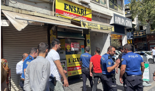 Benzin və tüfənglə iş yerinin damına çıxdı:"Özümü yandıracağam"- FOTO