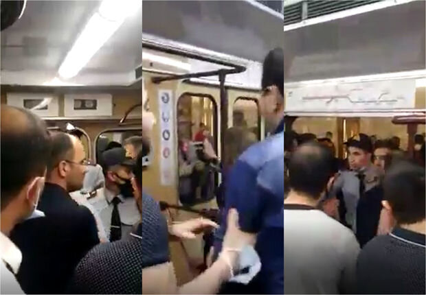 Bakı metrosunda polislə sərnişin arasında dava düşdü - VİDEO