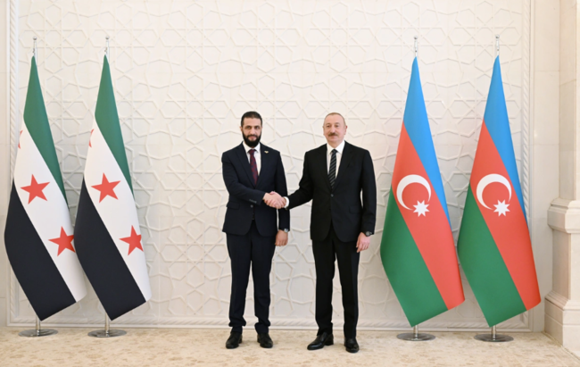 İlham Əliyevin Suriyanın keçid dövrü prezidenti ilə geniş tərkibdə görüşü olub