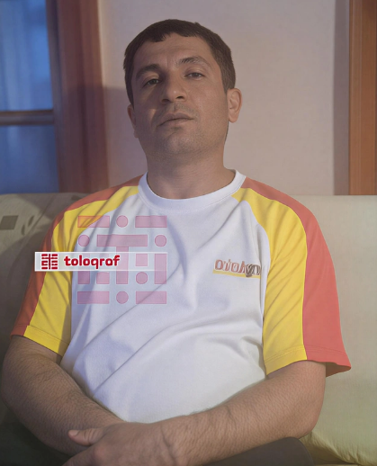 Qardaşı övladlarını baltalamaqda ittiham edilən əminin fotosu